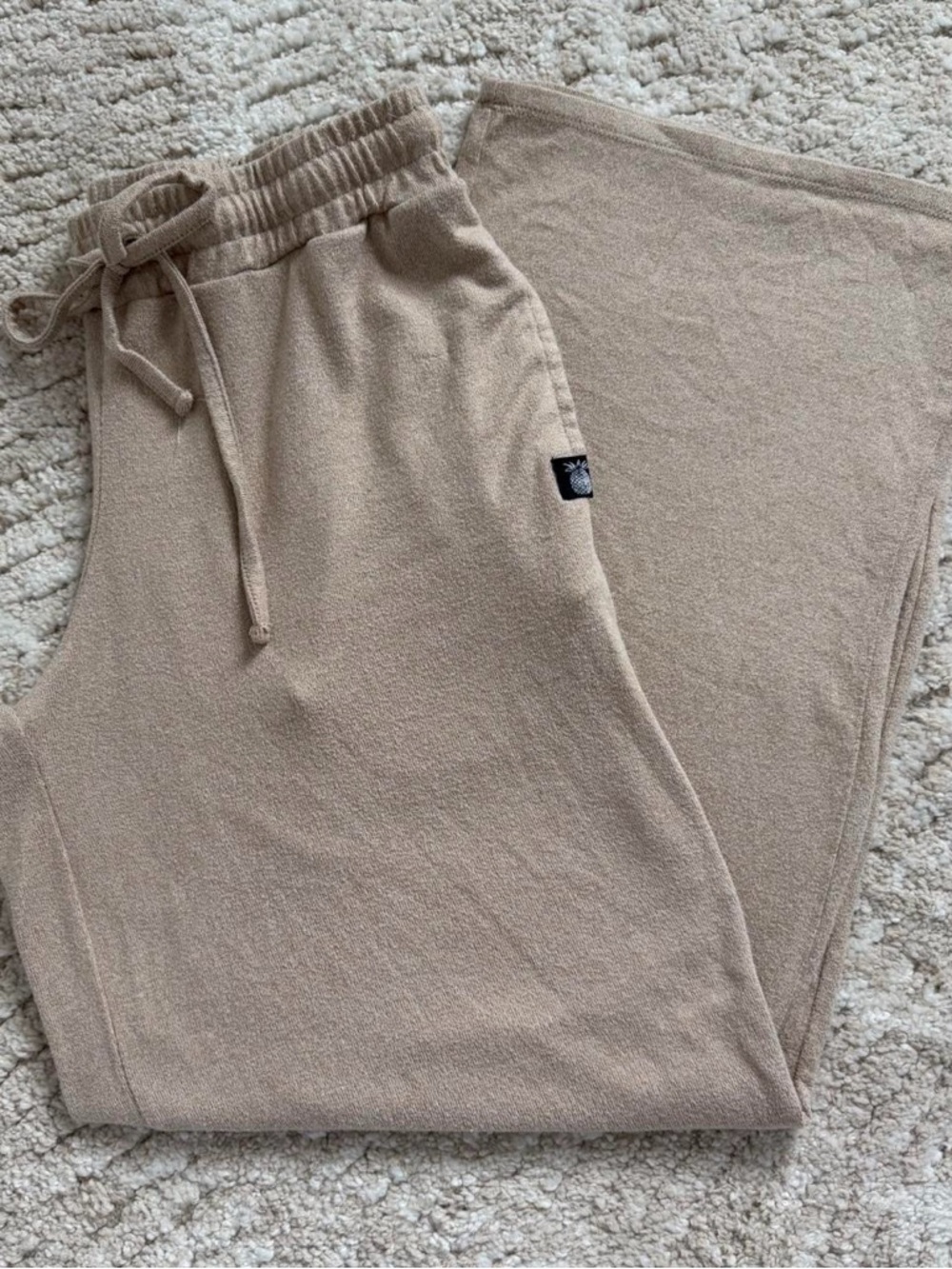 KaiAhola Supply tan wide leg sweatpants.
